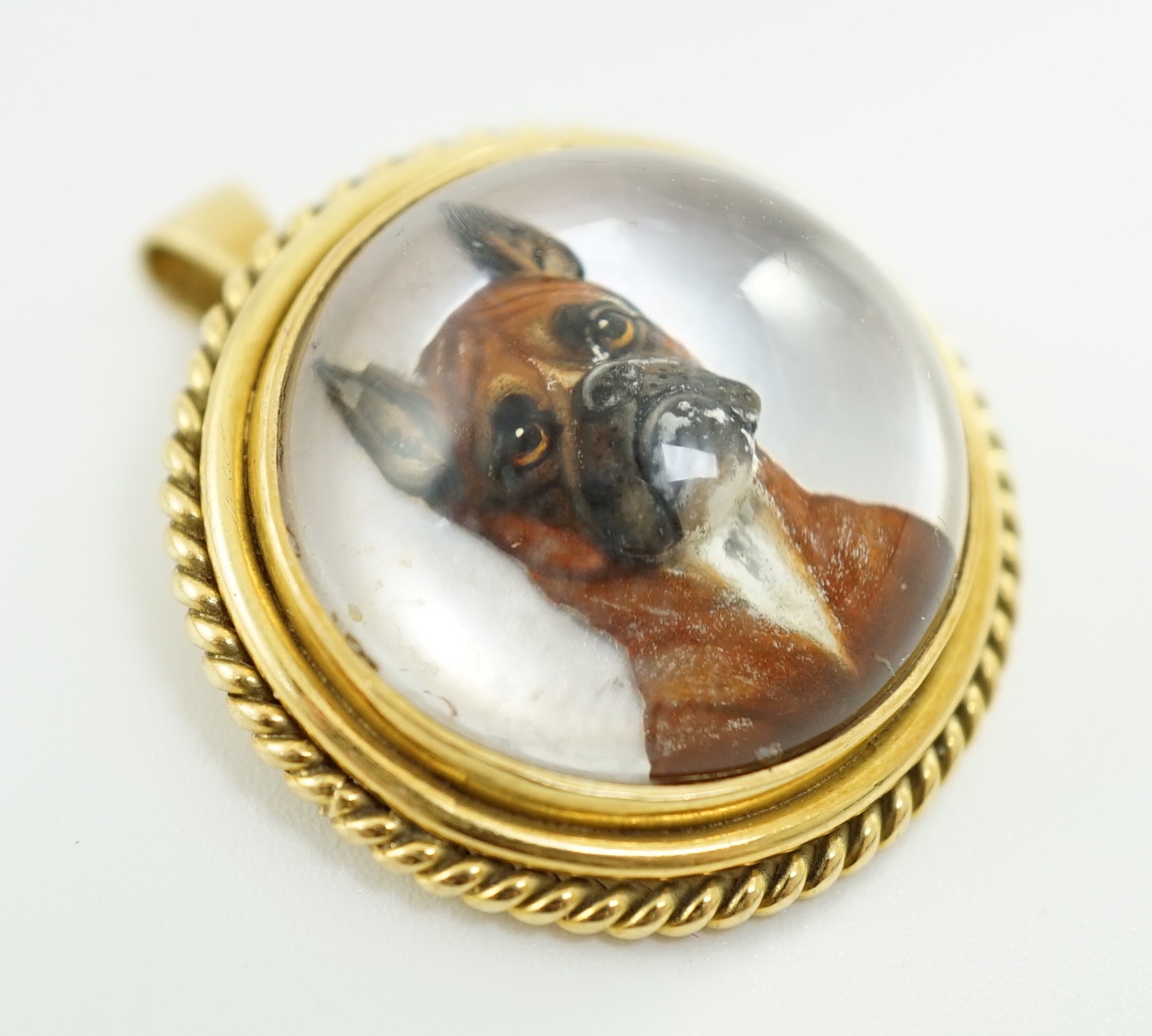 A Victorian gold mounted Essex crystal pendant brooch, decorated with head of a boxer dog